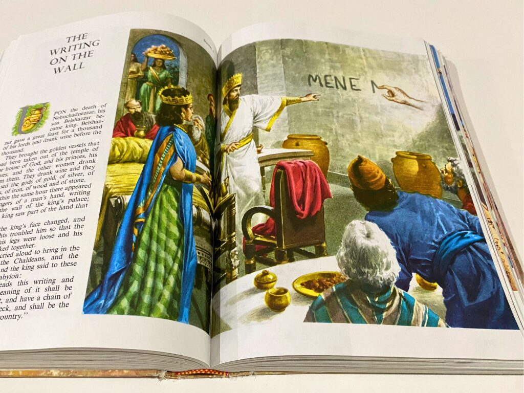 Illustrations and text from The Children's Bible story The Writing on the Wall from the Old Testament book